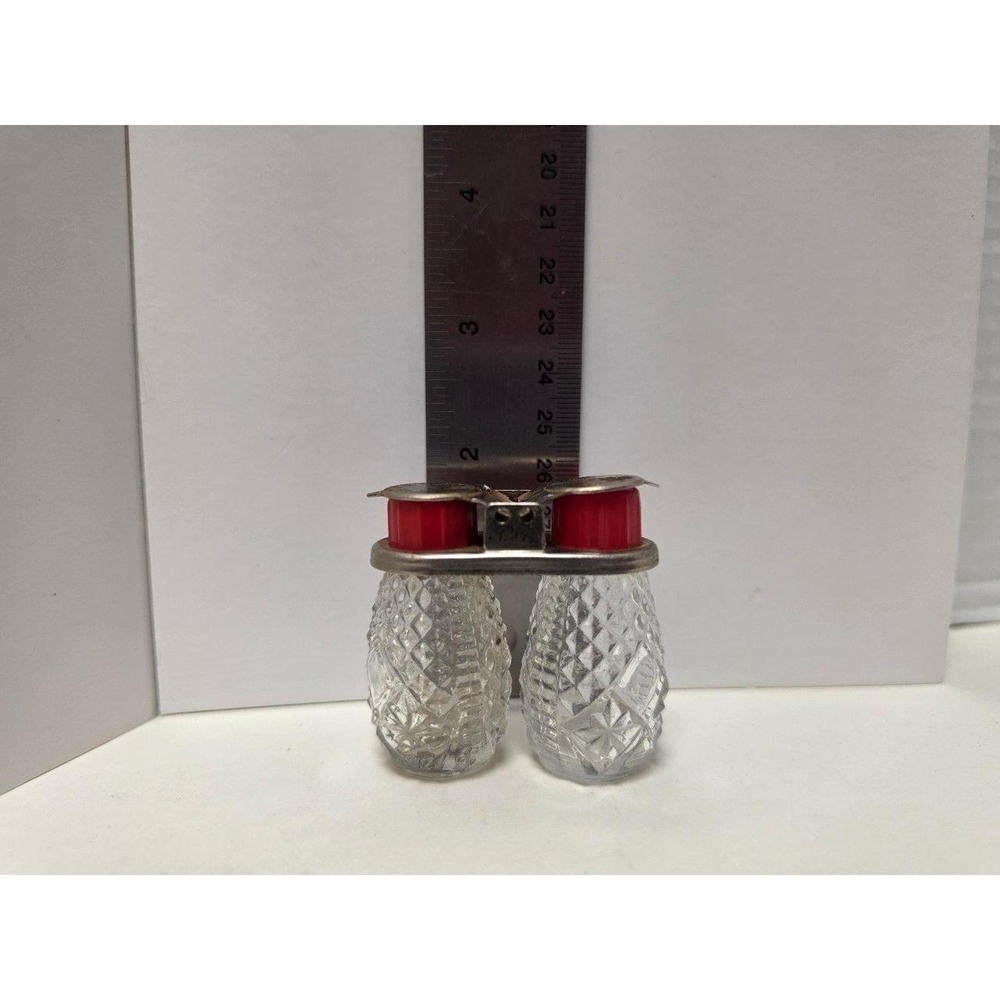 vintage travel salt and pepper shakers with a pressed glass, diamond-cut pattern